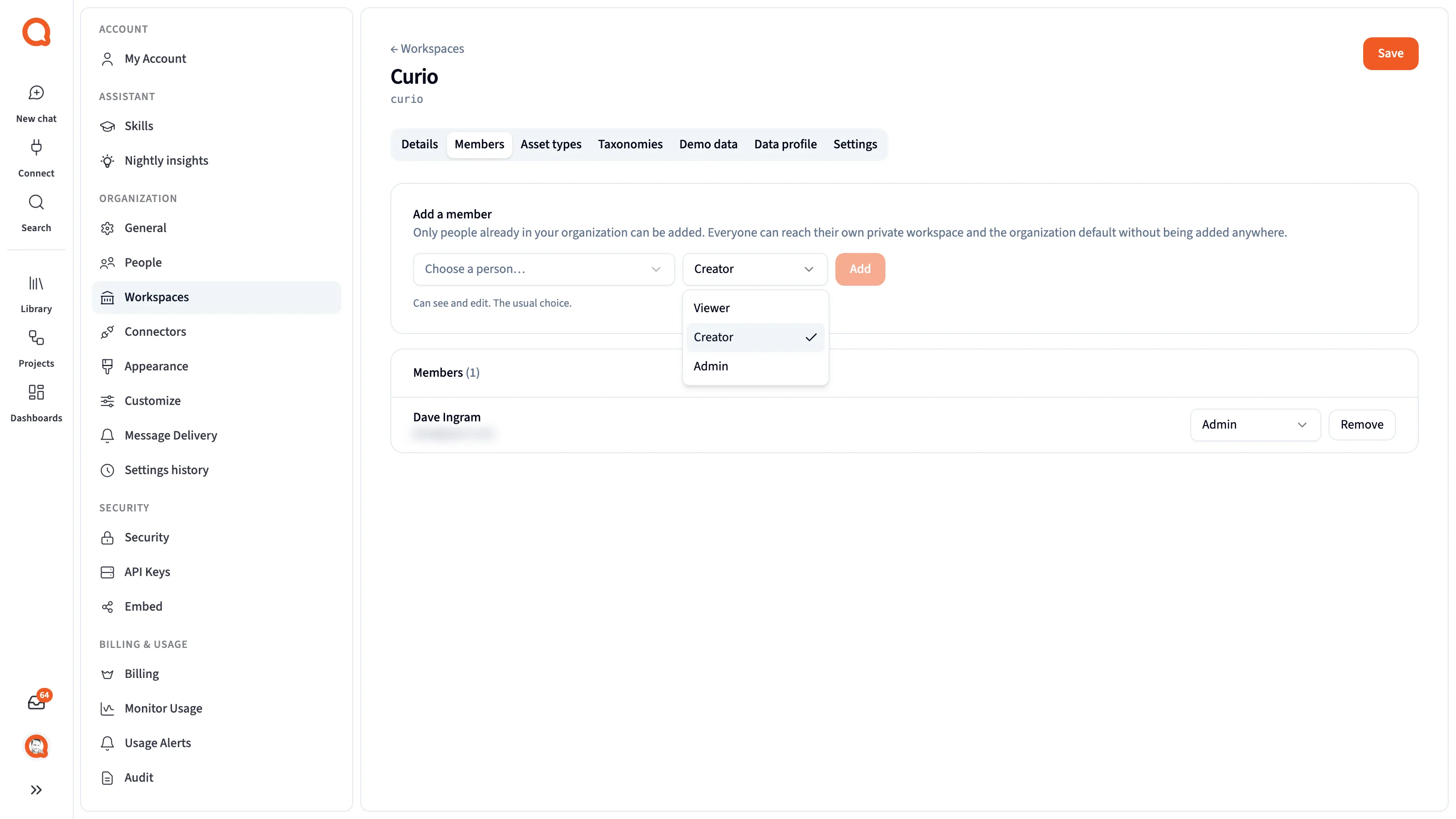A workspace's Members tab, with the role select open